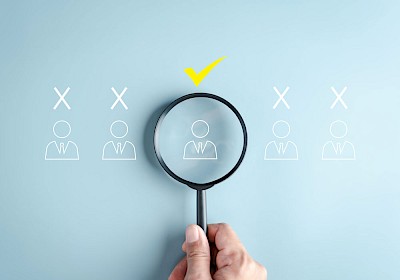 Magnifying glass, the illustration enlarged, to illustrate the objectives of Digital HR Marketing Magnifying glass