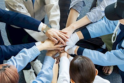 Digital HR Marketing: A team's hands held together
